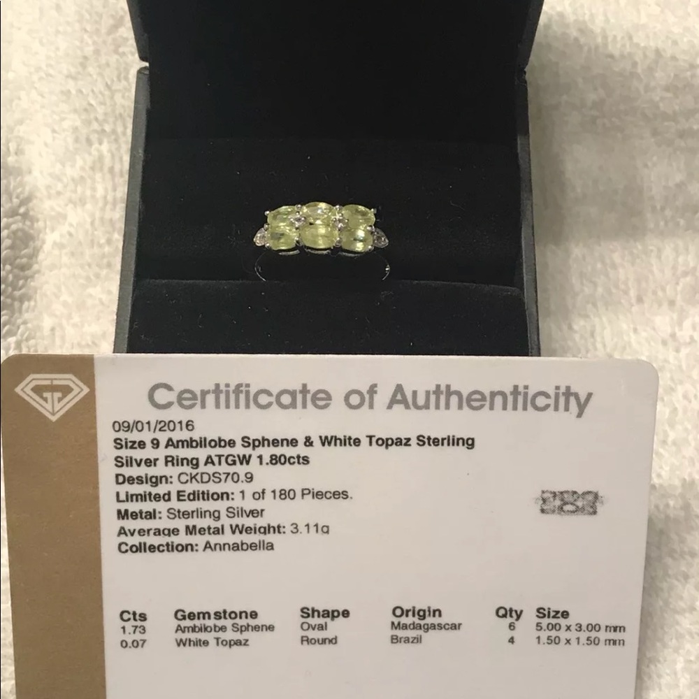 Genuine Ambilobe sphene and white topaz ring